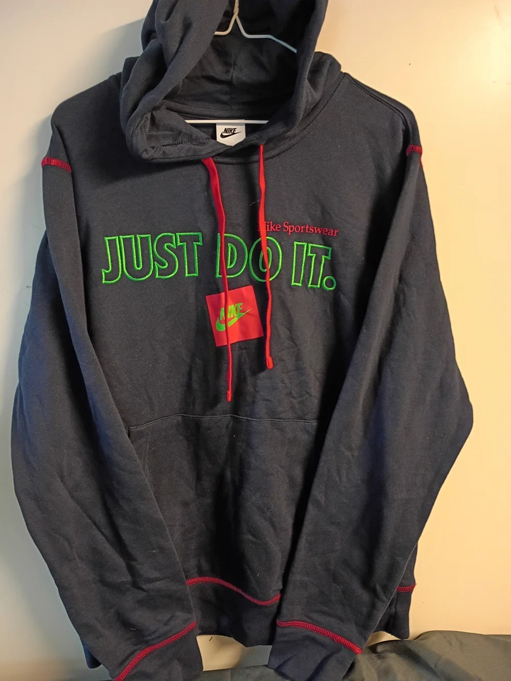 Nike Women's Navy Hoodie with Neon Green 'JUST DO IT.' and Red Accents